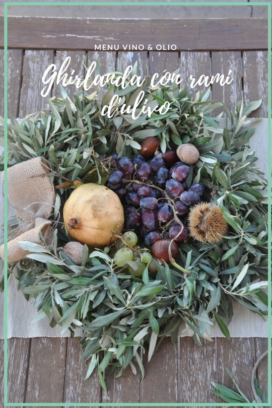 Ghirlanda con rami d'ulivo, con frutta di stagione